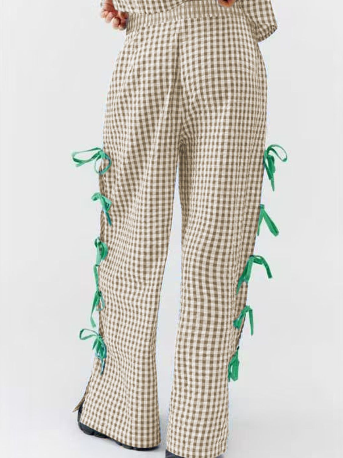 Gingham wide-leg trousers in tan with green bow details down the side seams.