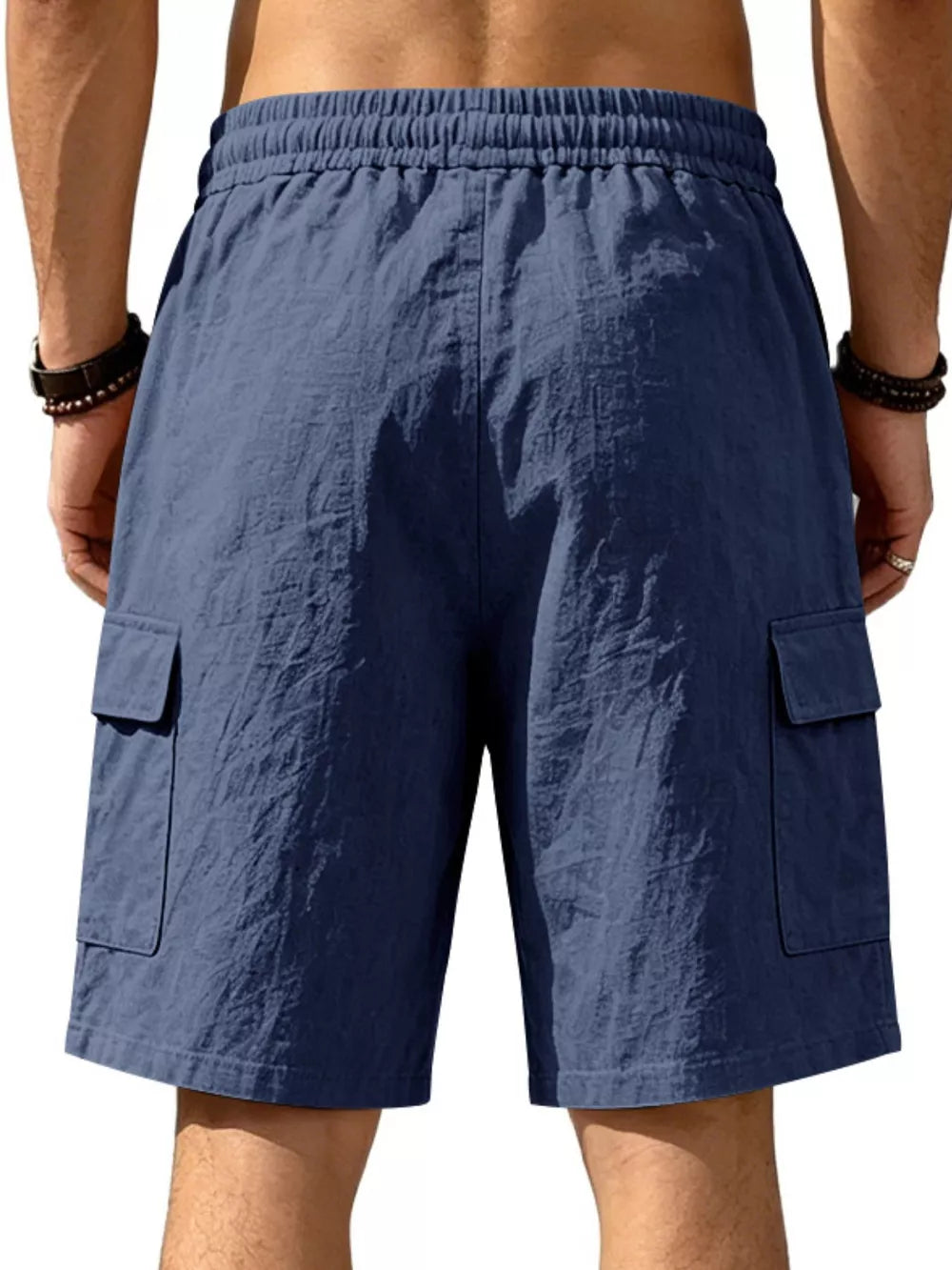 Navy blue cargo shorts with drawstring waist and crinkled texture.