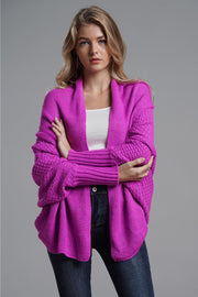 Cocoon knit sleeve cardigan in Vivid Violet acrylic with open front and ribbed cuffs.
