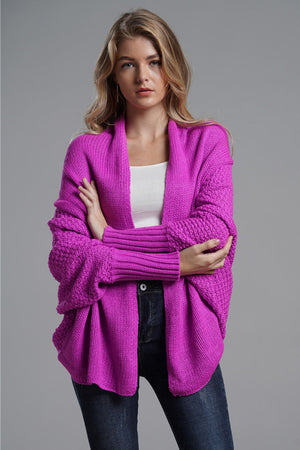 Cocoon knit sleeve cardigan in Vivid Violet acrylic with open front and ribbed cuffs.