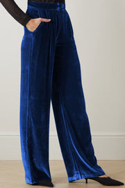 Velvet palazzo trousers in dark blue with a high waist and wide legs.
