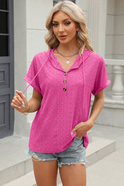 Hot Pink perforated henley hooded tee with short sleeves and button detail.
