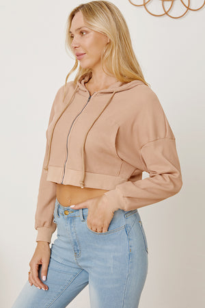 Waffle knit cropped zip hoodie in khaki with drawstring hood and pockets.