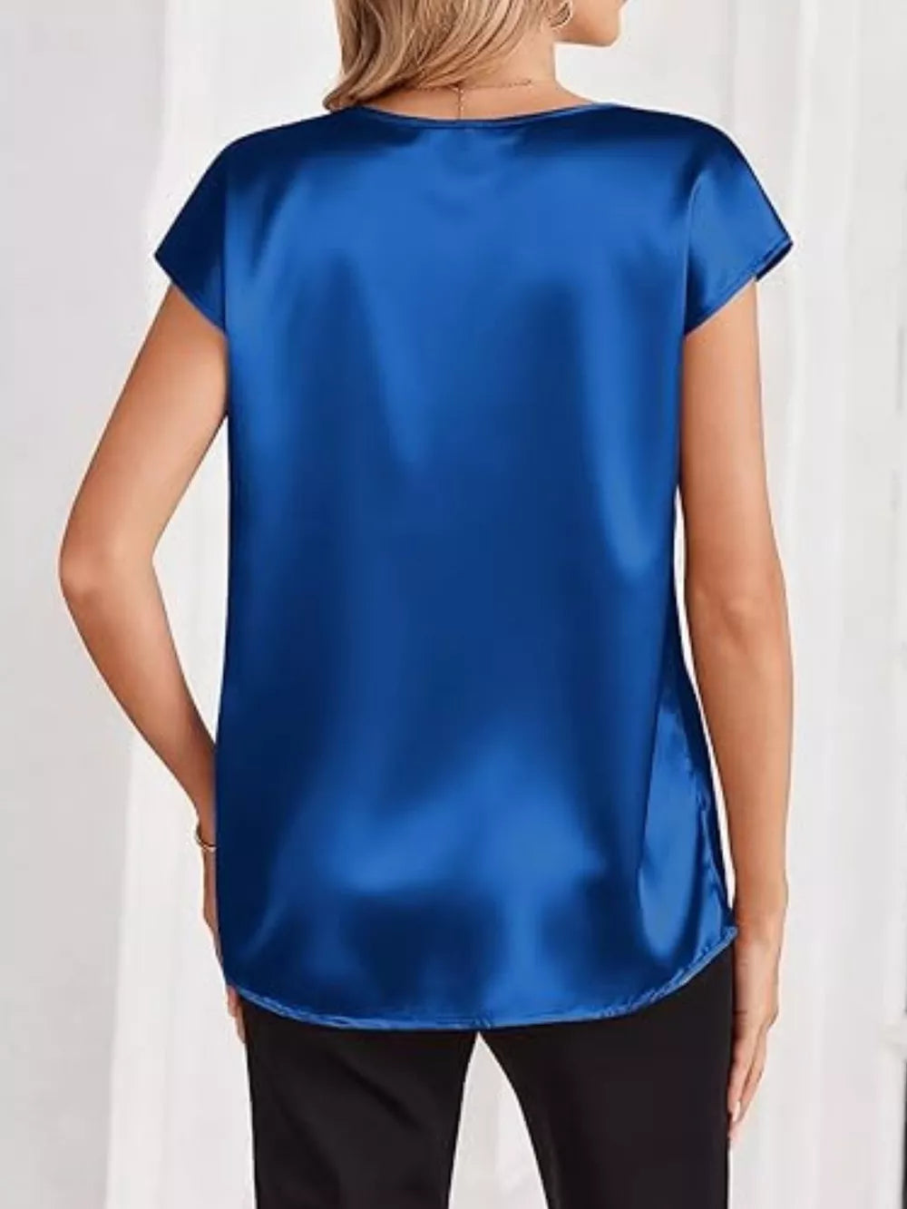 Royal blue satin V-neck short sleeve maternity shirt with a relaxed fit.