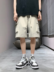 Men's apricot lightweight cargo shorts with drawstring waist and multiple pockets.