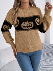 Camel acrylic knit sweater with jack-o'-lantern intarsia pattern and crew neck.