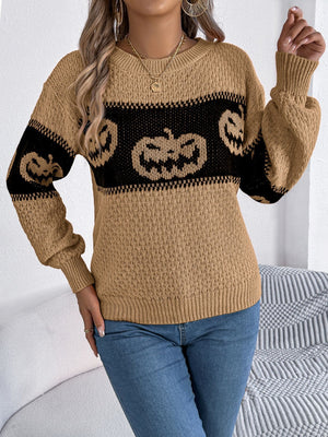 Camel acrylic knit sweater with jack-o'-lantern intarsia pattern and crew neck.