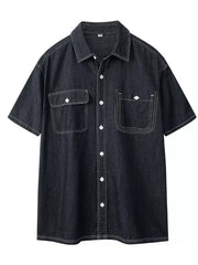 Black denim button-up shirt with white contrast stitching and two chest pockets.