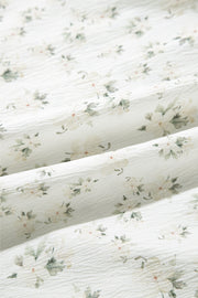 White floral smocked bodice wide-leg jumpsuit fabric detail