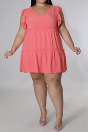 Coral tiered ruffle babydoll mini dress with V-neck and flutter sleeves.