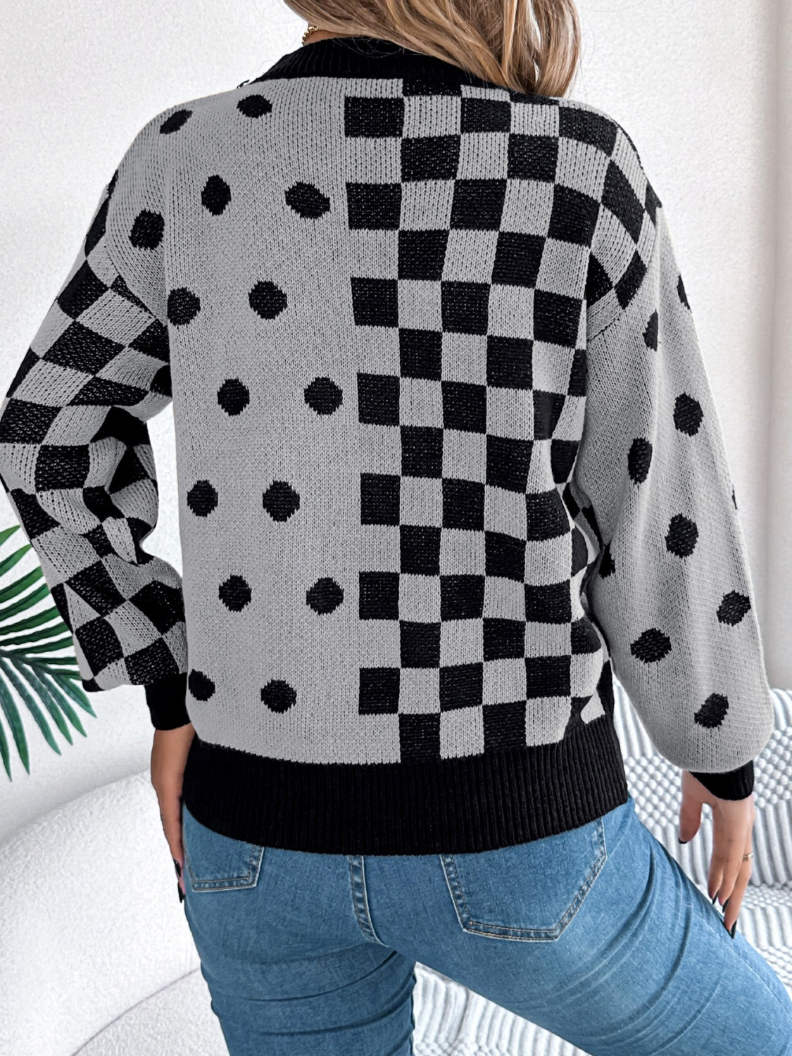 Gray acrylic sweater with checkerboard and dot intarsia pattern, crew neck, long sleeves.