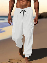 White waffle knit joggers with drawstring and cargo pockets.
