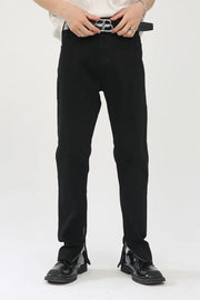 Black denim trousers with zip hem detail and a straight leg cut.