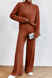 Ribbed knit turtleneck lounge set in rust with wide leg pants and long sleeves.