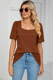 Caramel tee with square neckline and sculpted puff sleeves.