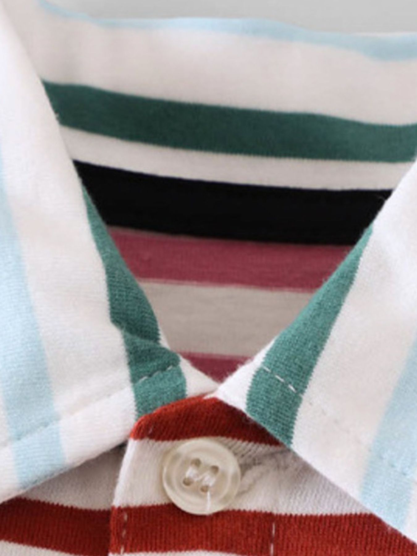 Striped polo shirt with button detail, featuring white, teal, green, black, and red stripes.