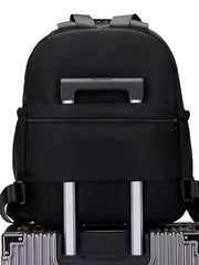 Black Oxford cloth backpack with trolley sleeve and adjustable straps.