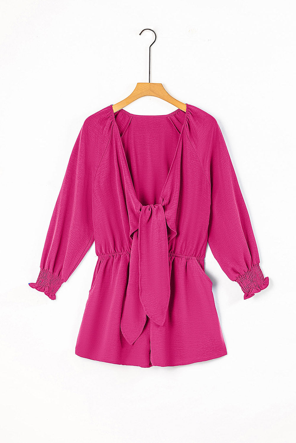 Cerise tie-front blouson sleeve playsuit with smocked cuffs and elastic waist.