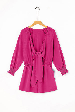 Cerise tie-front blouson sleeve playsuit with smocked cuffs and elastic waist.