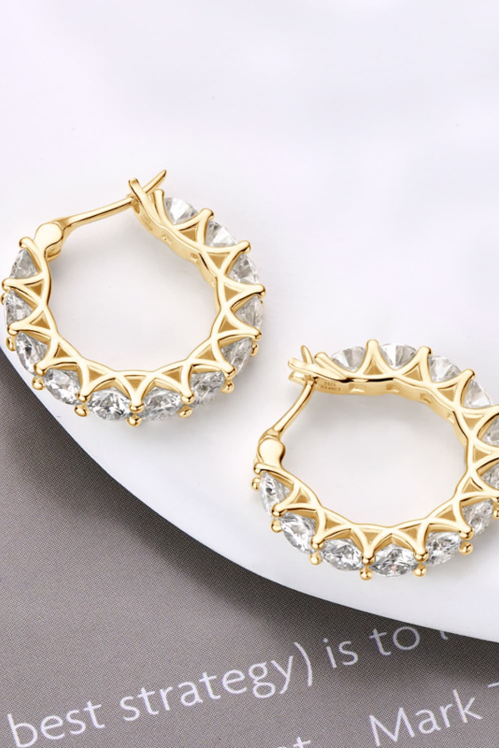 Gold moissanite pavé hoop earrings with clear stones