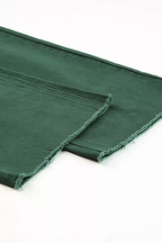 Green cotton jeans with raw hem detail and straight leg cut.