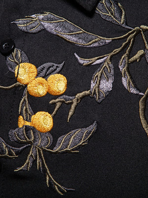 Black cotton undershirt with embroidered floral and fruit detail.