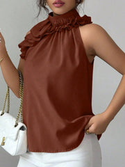 Ruffled high neck sleeveless top in red, black, apricot, or brown.