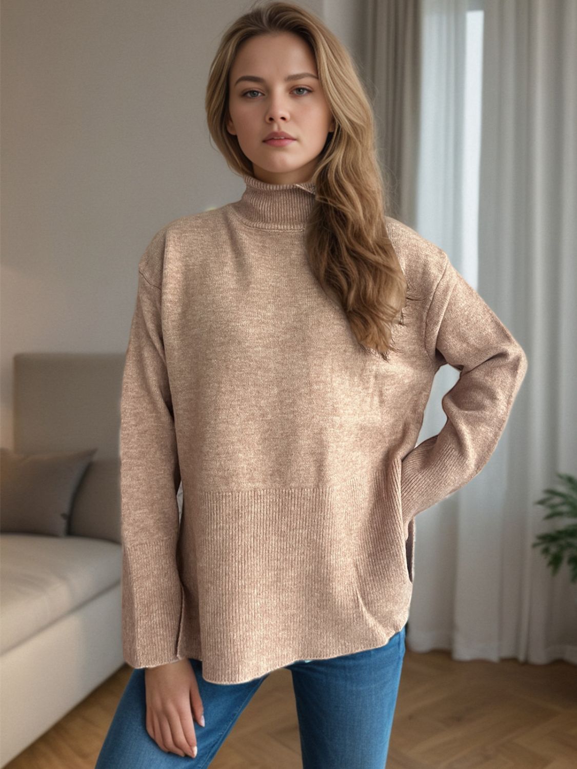 Camel ribbed hemline slit-side turtleneck knit sweater with ribbed cuffs.