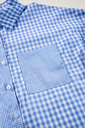 Light blue gingham oversized shirt with patch pocket and buttons.