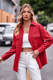 Oversized utility shirt in deep red with two chest pockets, button front, and long sleeves.