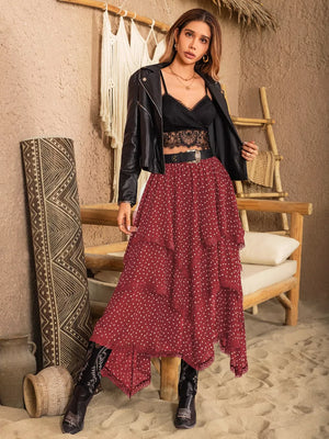 Burgundy tiered midi skirt with white polka dots and lace trim.