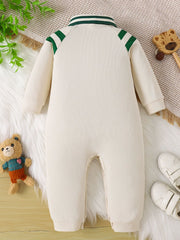 Baby beige long-sleeve one-piece with green striped collar and shoulder details