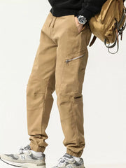 Men's Khaki cotton cargo pants with zipper pockets and elastic cuffs.