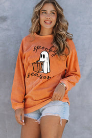 Orange corduroy sweatshirt with "Spooky Season" ghost graphic, crewneck, long sleeves.