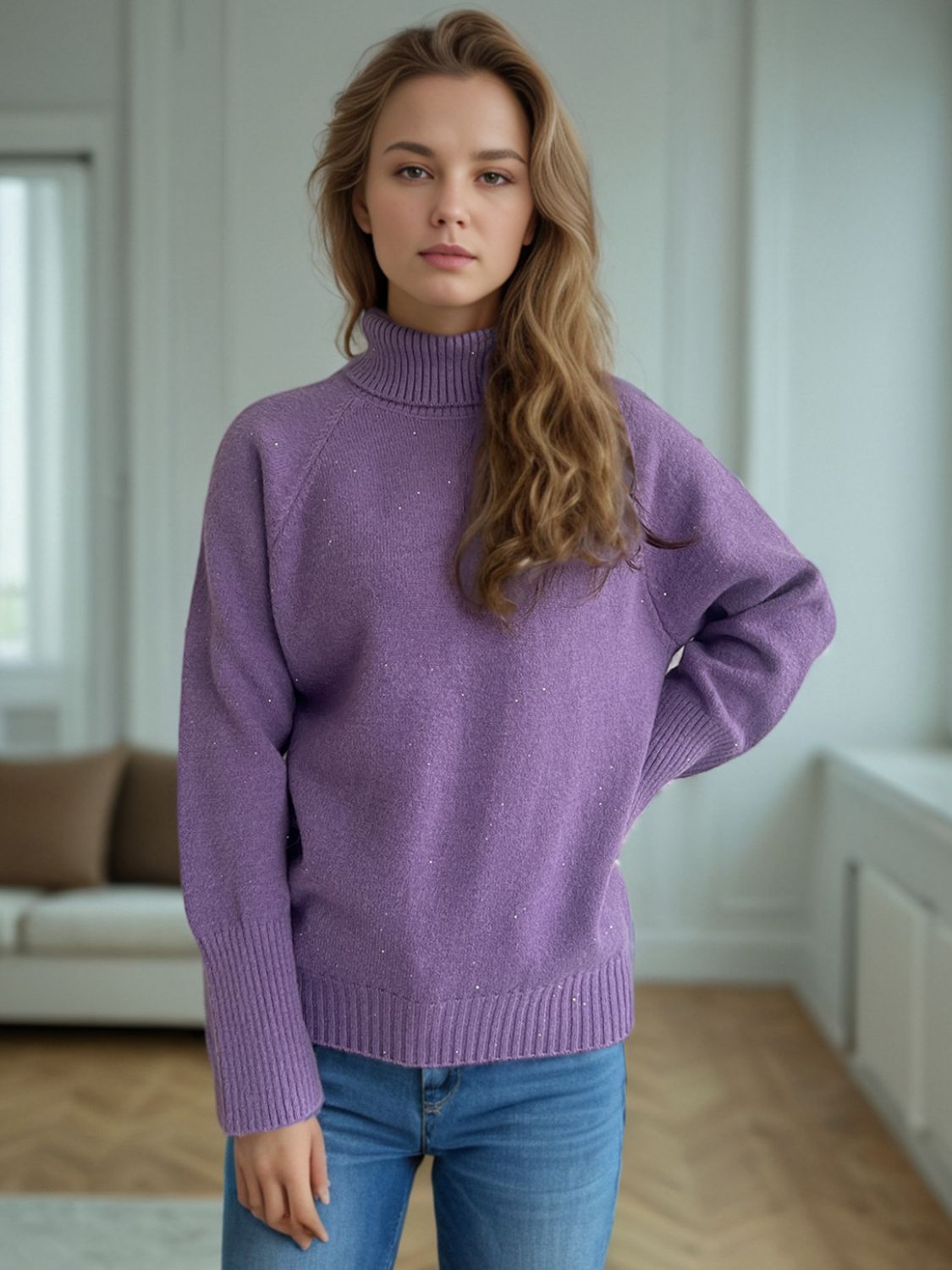 Purple ribbed turtleneck sweater with subtle sparkle detail and cuffed sleeves.