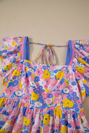 Floral mini dress with flutter sleeves, square neck, and tie back.