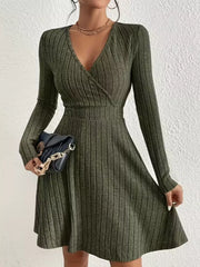 Army green ribbed wrap mini dress with long sleeves and V-neck, A-line skirt.
