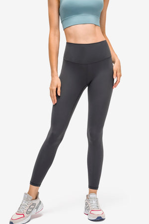 Dark gray StealthFit pocketed leggings with a high waist and full length.