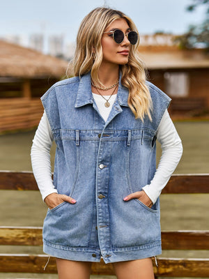Oversized denim sleeveless jacket in dusty blue with button front and pockets