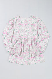 Blush pink floral print blouse with smocked waist and cuffs, round neckline, long sleeves.