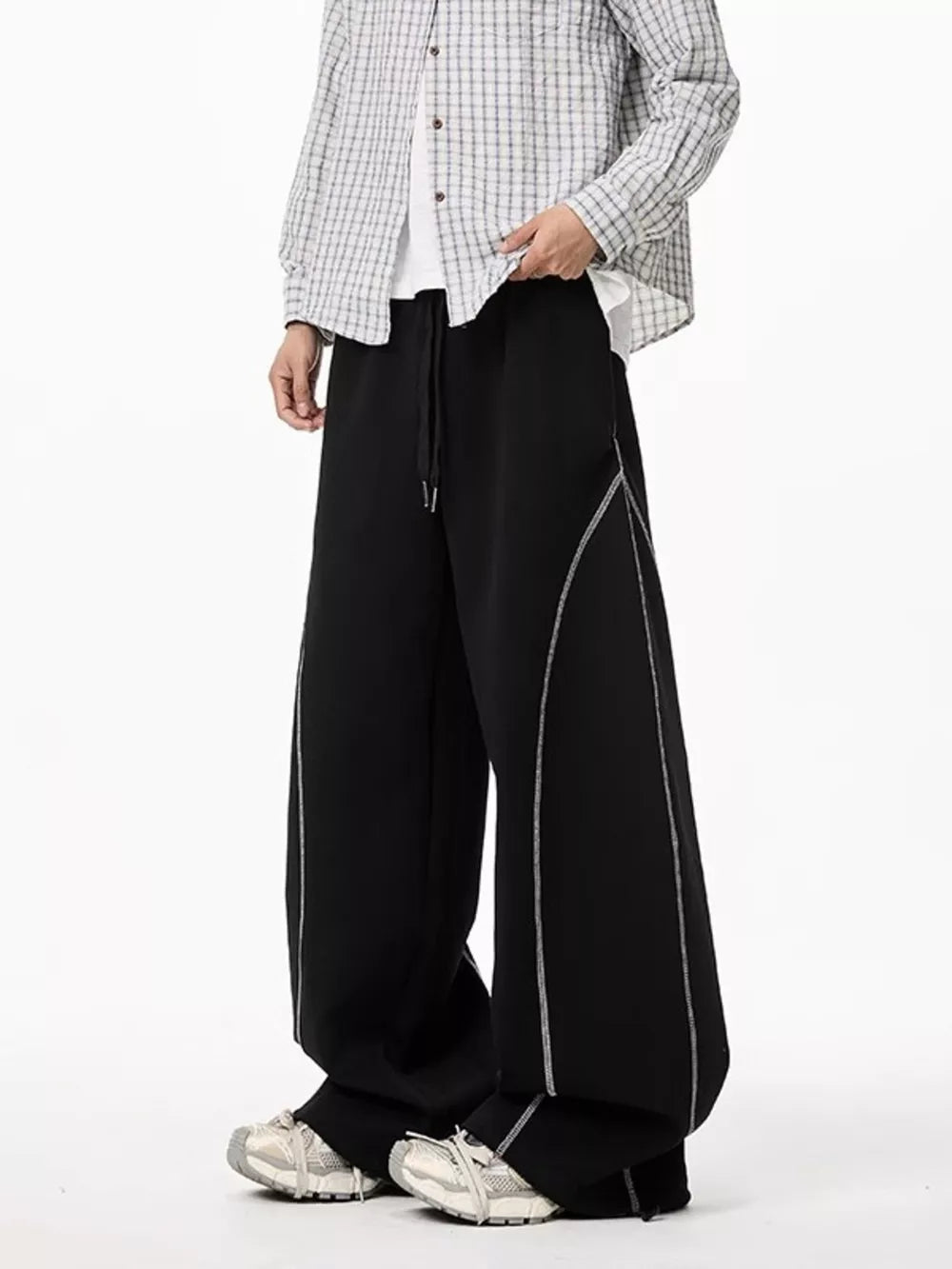Black wide-leg drawstring sweatpants with contrast stitching detail