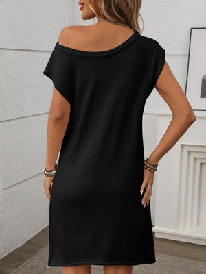 Black knit shift dress with off-the-shoulder neckline and short sleeves.