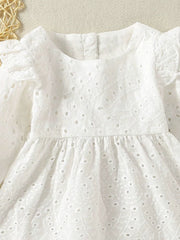 White cotton eyelet baby top with ruffled sleeves and gathered waist