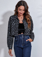 Black leopard print boxy shirt jacket with button front and collar.