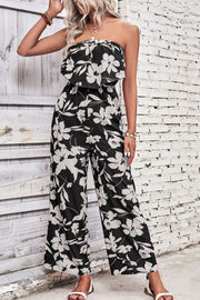 Black floral ruffle bandeau palazzo jumpsuit with wide legs.