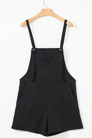 Black denim romper with adjustable straps and chest pocket