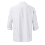 White linen-blend half-button shirt with rolled sleeves.