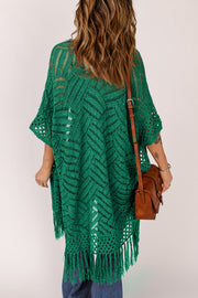Green open knit chevron fringe cardigan with short sleeves and a boho vibe.