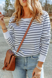 Nautical stripe crewneck sweatshirt with white and navy stripes, crew neck, and long sleeves.