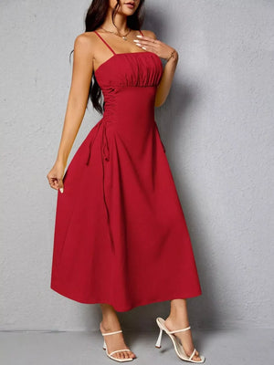 Deep Red cami dress with ruched bodice and crisscross lace-up sides, A-line skirt.